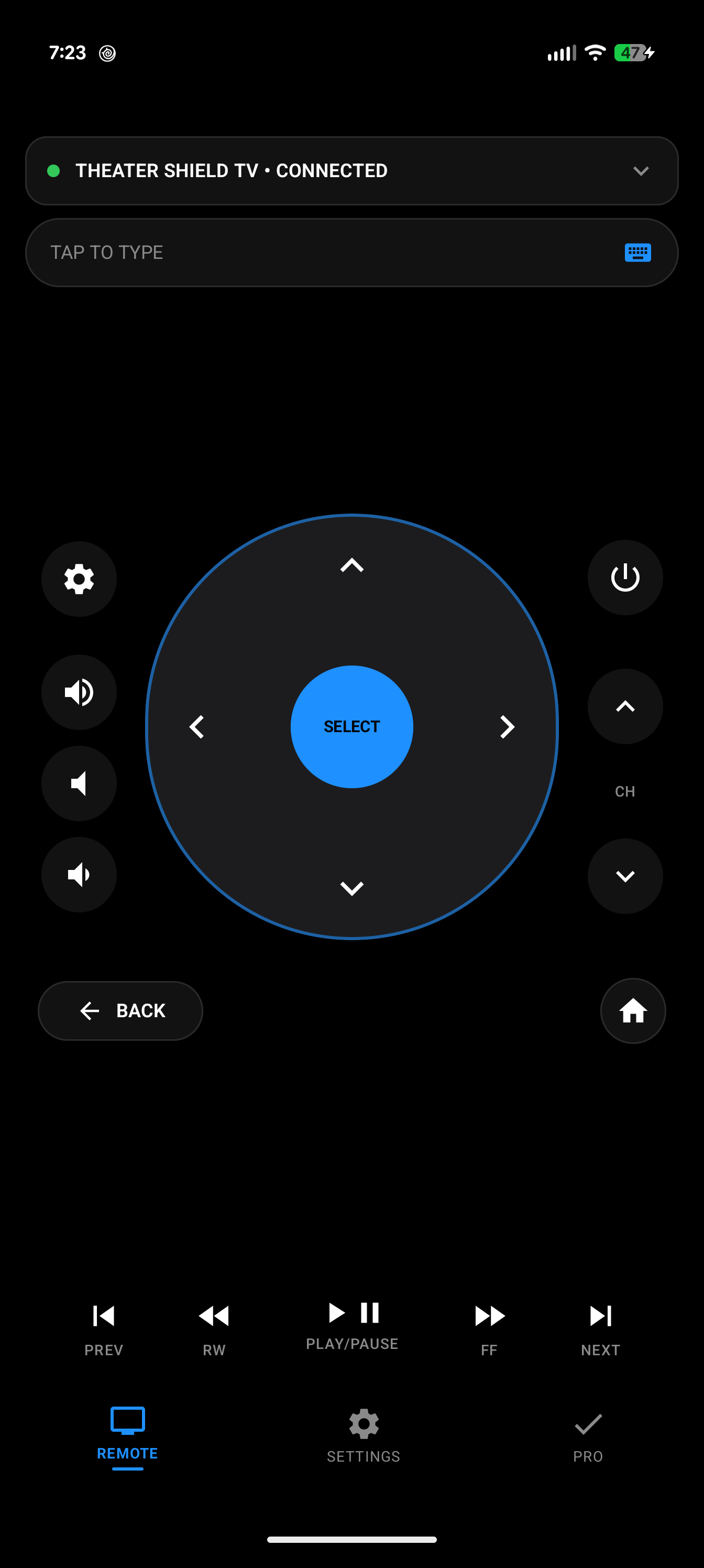 Mote's Remote screen, connected to a Living Room TV, showing the full D-pad, volume, power, and media controls